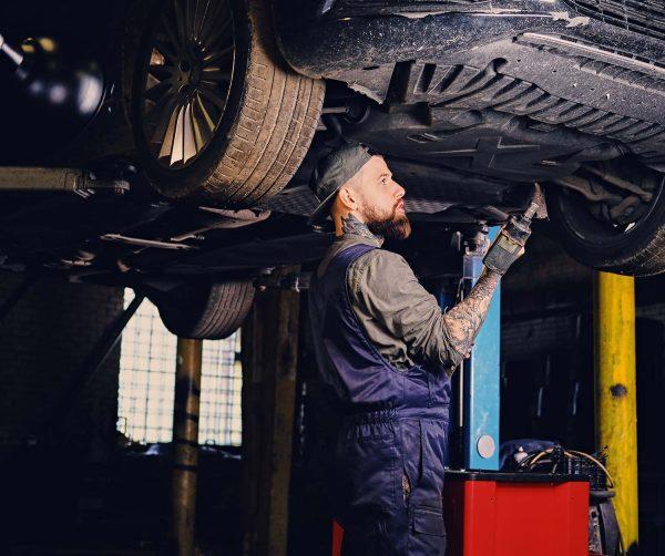 Mechanic working on chassis